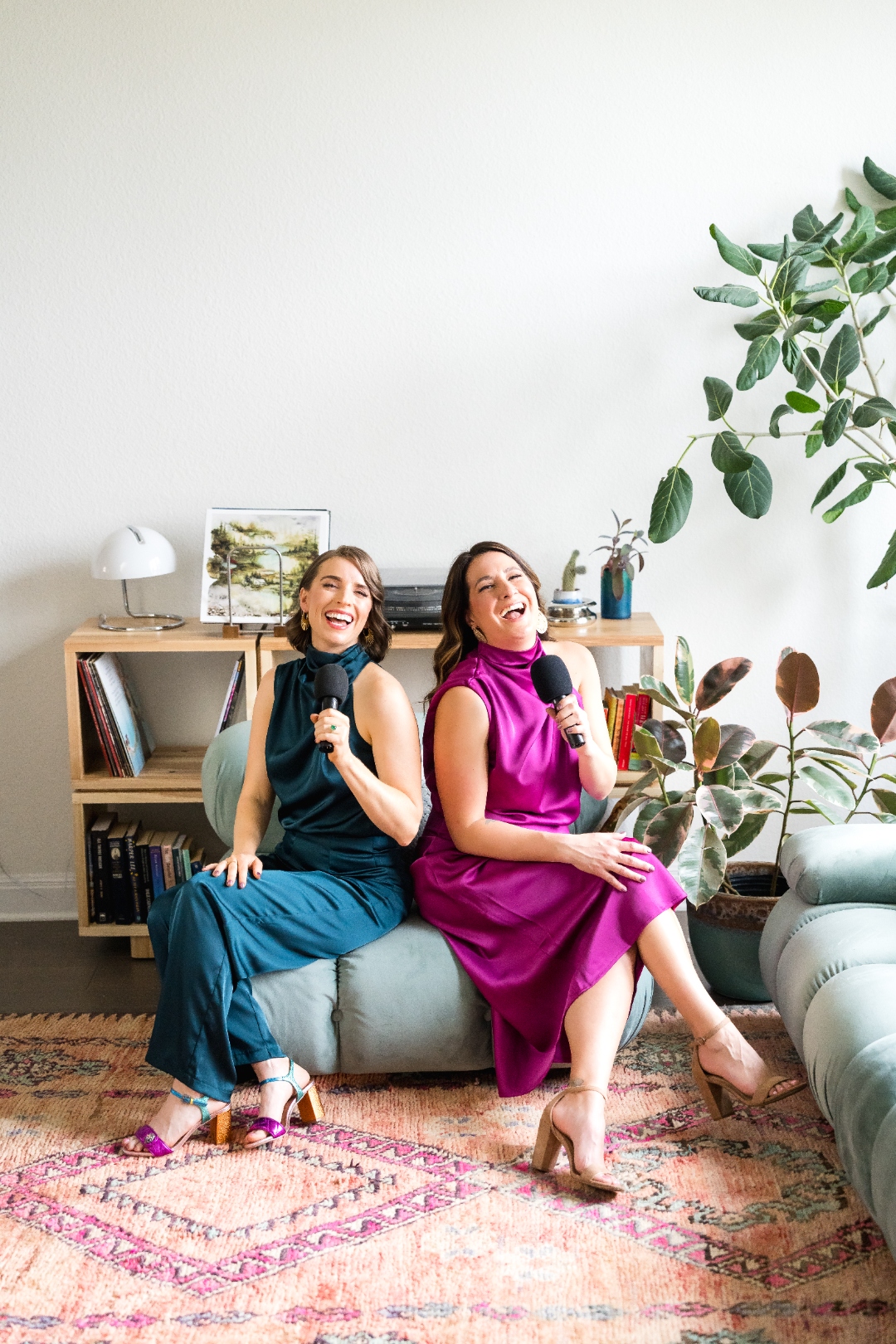 Robin Welch and Deborah Andrews laughing together while recording the Art of Classiness podcast